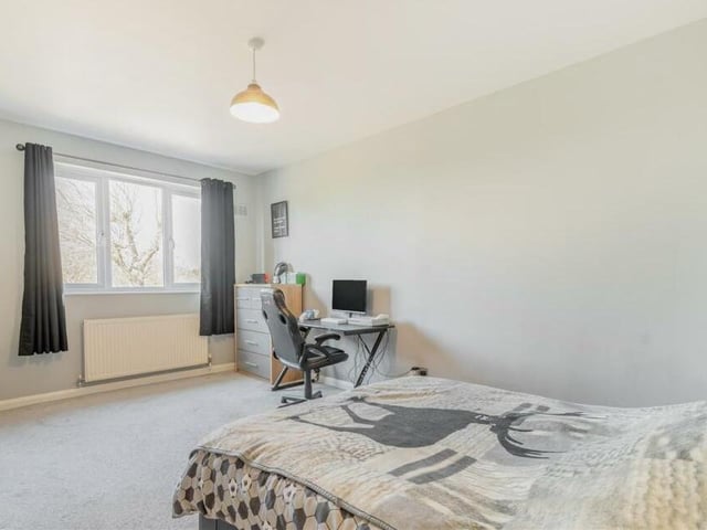 Bedroom number four, which overlooks the front of the bungalow, has space for a desk and other furniture.