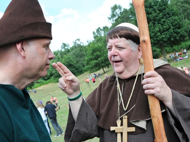 Friar Tuck, aka, Phil Rose from TV's Robin of Sherwood, gives Chad's Kev Rogers a blessing at the opening ceremony on Monday.