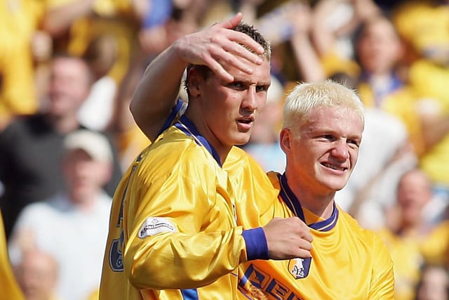 Rhys Day of Mansfield celebrates his goal with team mate Bobby Hassell.