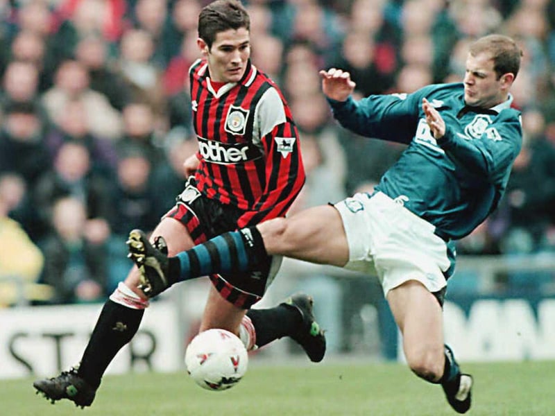 Nigel Clough is pictured in action for Manchester City at Everton. He had joined City for £1.5m, making 39 appearances for the club between 1996 and 1998.