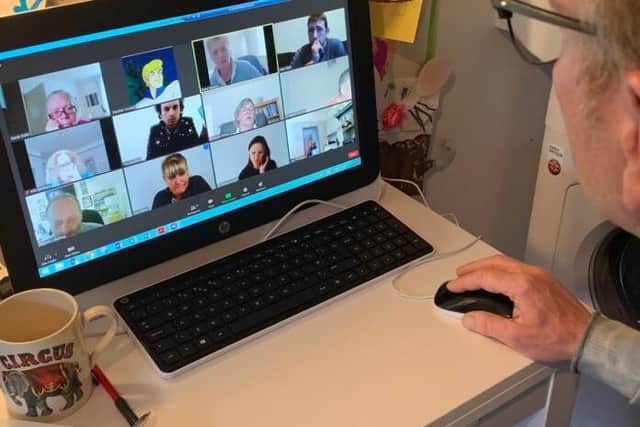 Double Impact has adapted to lockdown by holding group calls on Zoom.