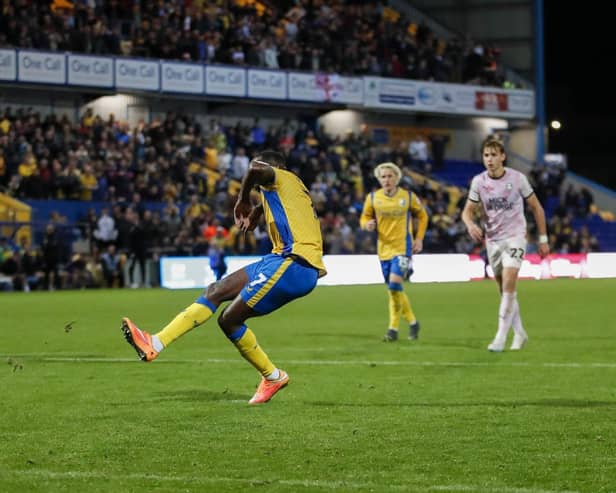 Mansfield Town progressed after beating Peterborough United on penalties.