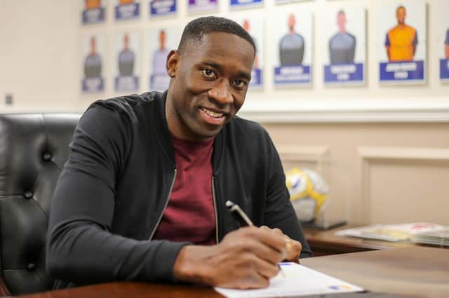 Lucas Akins signs for Mansfield Town.