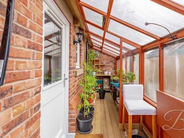An interesting feature of the garden at the £625,000-plus Mansfield property is this lean-to greenhouse. The garden also has an electric-car charging point, alarm system and security camera.