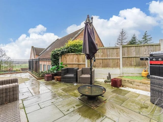 A stunning patio area provides the perfect space for outdoor dining.