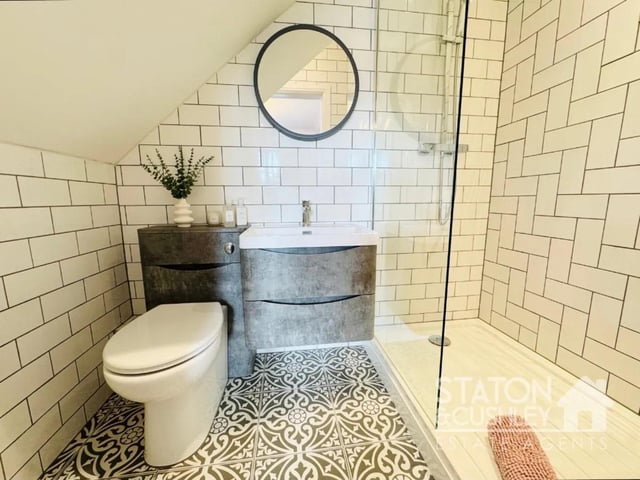The modern downstairs shower room with WC is ideal for a family.