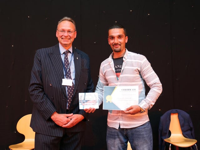 Jamsheed Noorzai proudly accepted his principal's award