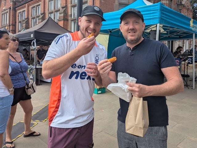 These two football fans took the chance to sample some of the festival snacks before the Forest game.