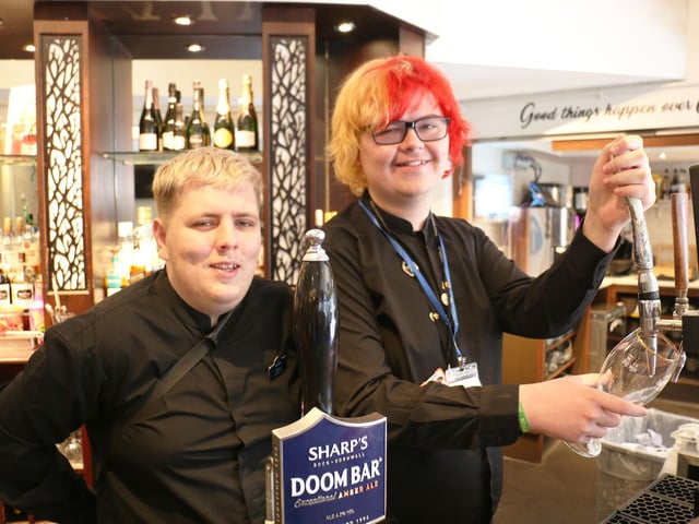 Former student Danny Parnham (left) with Keeton Wilson (right) in the Pavillion bar