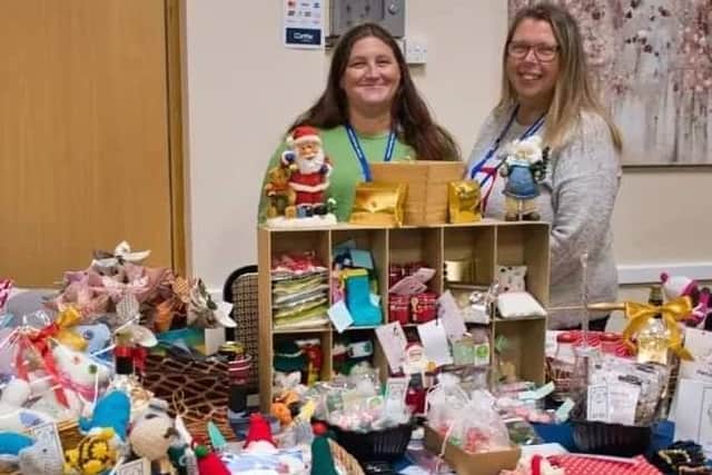 Staff members Jenni Bishop and Sam Clarke at a community event in Selston, selling crafts, made by Ashfield Voluntary Action volunteers.