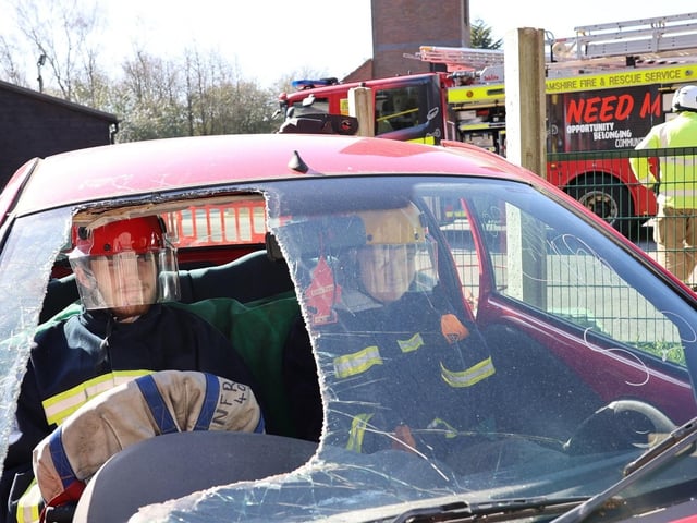 A simulated road traffic collision exercise. Two learners acted as casualties while the Green Watch crew demonstrated emergency response procedures, including vehicle stabilisation and casualty extraction. Images Paul Horton