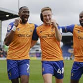 Lucas Akins, Davis Keillor-Dunn and Hiram Boateng celebrate Keillor-Dunn's brace in Saturday's win over Crawley Town. Photo by Chris & Jeanette Holloway/The Bigger Picture.media.