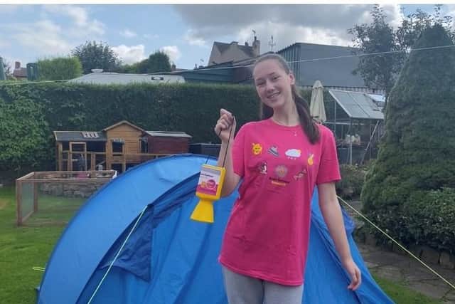 Ruth Lamb pictured during a recent fundraiser - the 14 year old from Kirkby has been involved in a sponsored sleep out in a tent and a walk for Brain Tumour Research