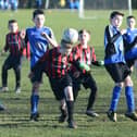 A cracking header away is made during a game between Manor FC v Blidworth Welfare.