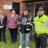 Police and council officials at the Scargill Walk flats in Eastwood.
