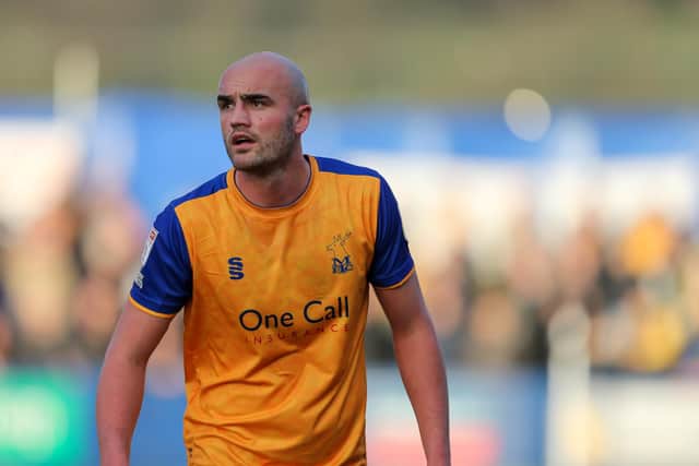 Mansfield Town defender Farrend Rawson was sent off for two yellow cards in the 39th minute. Stags were leading 2-1 before they extended their lead to win 3-1.