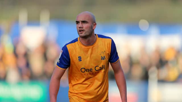 Mansfield Town defender Farrend Rawson was sent off for two yellow cards in the 39th minute. Stags were leading 2-1 before they extended their lead to win 3-1.