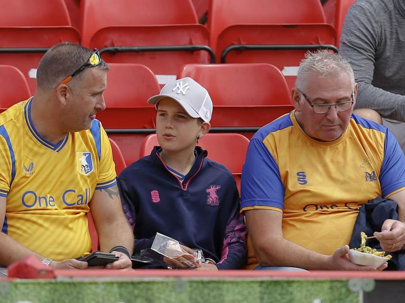 Mansfield Town fans watch a convincing 4-0 win at Alfreton Town.