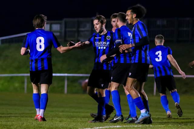 Scorers Gaz Curtis (centre) and Lewis Belgrave (second from right) celebrating the opening goal
