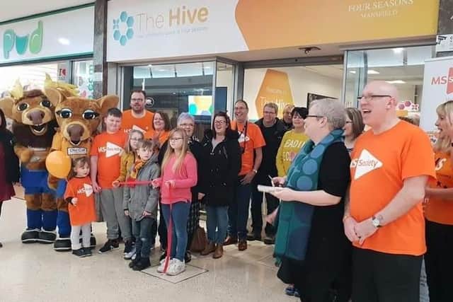 Tom (right) with fellow volunteers, members of the Mansfield MS Society (and mascots!) at The Hive community space in the Four Seasons Shopping Centre, where he set up an information hub for those with MS.