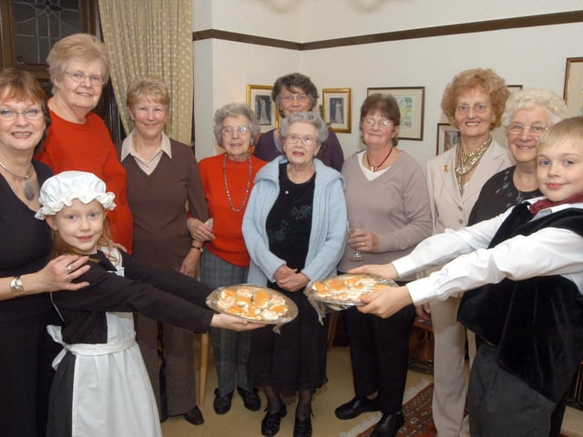 Members of the local committee of Macmillan Cancer Support were served in style at their annual Christmas Evening in 2006