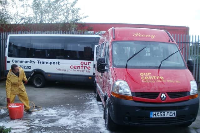 Our Centre volunteer Gary Cooper cleaning buses at the Kirkby centre.