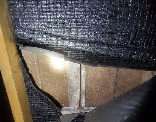 Hole in the roofing felt of the house at Meden Crescent
