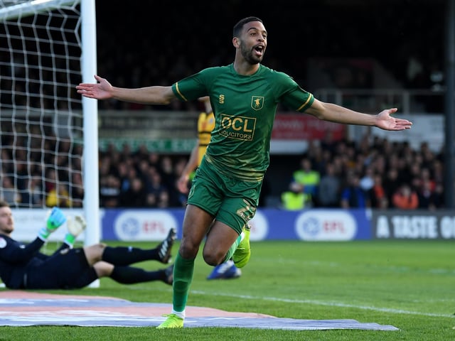 CJ Hamilton celebrates scoring Mansfield Town first goal during play-off semi-final first leg match at Newport County.