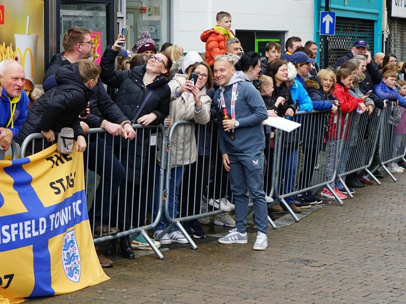 Crowds packed into Mansfield town centre this afternoon to salute their heroes.