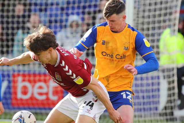 Oli Hawkins in action against Northampton Town.