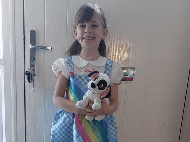 Eleanor, 6, from Stanton Hill dressed as Dorothy and her Dalmatian as Toto