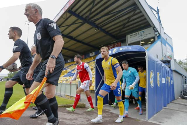 Football is back - the teams enter the field of play prior to the start of the pre-season match against Rotherham on Saturday. Photo by Chris & Jeanette Holloway/The Bigger Picture.media