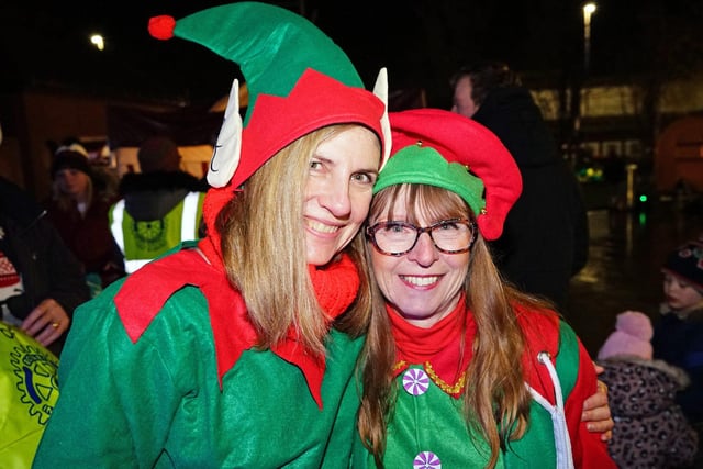 Elves Mellisa Blythe and Peta Aston took a break from Santa's workshop to join the town's celebrations.