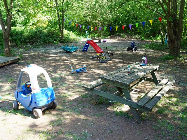 What adds to the mystique of The Secret Garden is its wilderness, where visitors can become immersed in nature and young children can play among the trees.