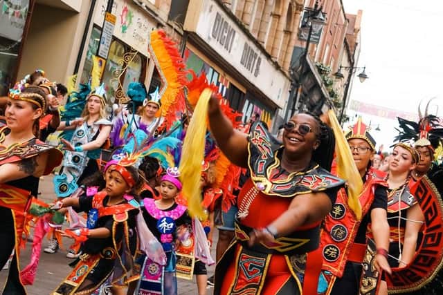Performers dance through the streets of Mansfield in 2023