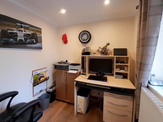 Another appealing facet of the Kirkby property is that it lends itself to working from home if required - thanks to this compact study. The room has a laminated floor and recessed spotlights to the ceiling.