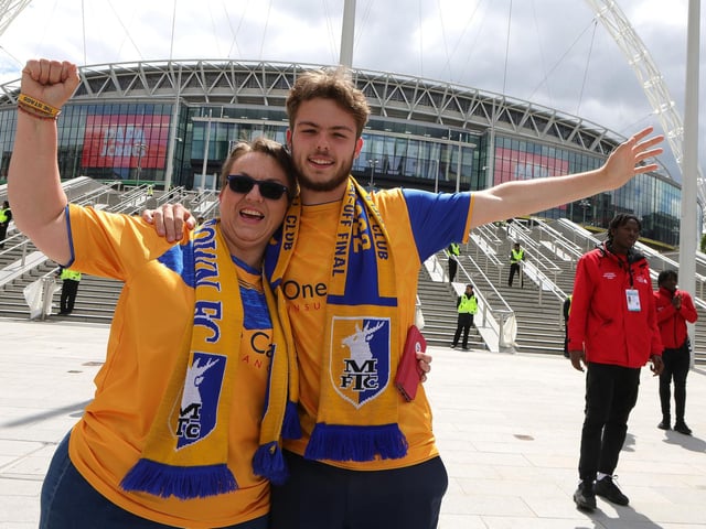 Mansfield Town fans soak up the Wembley atmosphere.