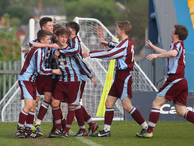Liam Beardsley is mobbed by his team mates after scoring for Underwood Villa.