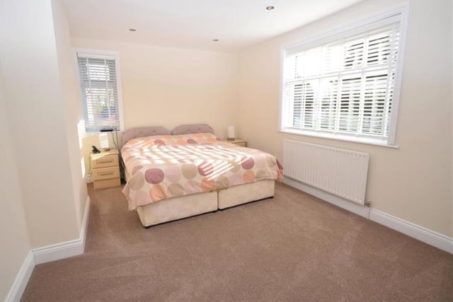Another pleasant double bedroom. Downlighting adds to the feel of the room, which is wonderfully bright thanks to uPVC windows to the side and rear of the house.