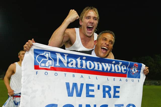 Liam Lawrence and boss Keith Curle of Mansfield celebrate reaching the play-off final in 2004