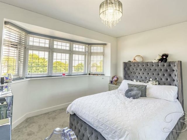 All the other three bedrooms at the Derby Road property are immaculately presented and boast underfloor heating. This one has a large bay window facing the front of the house.