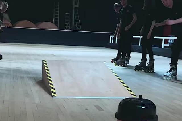 The brave pink hoover Hetty steals the show at a Derbyshire skating rink as she has a go at jumping at a ramp before receiving a standing ovation from the other rollerskaters.