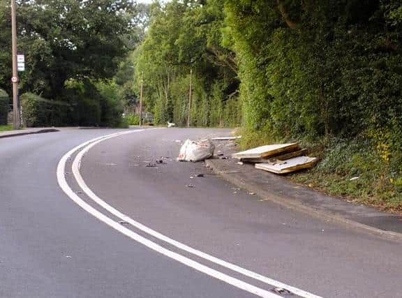 Fly tipping at the side of the road.