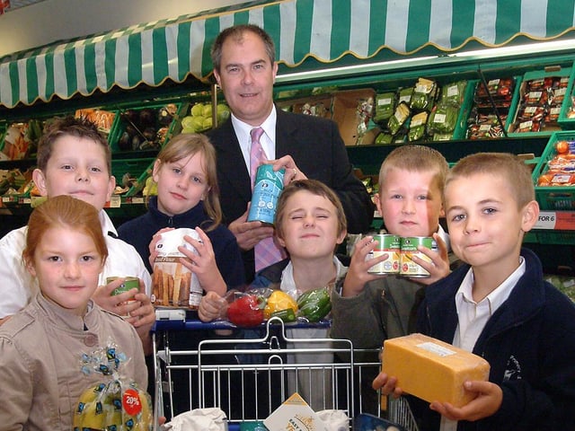 Pupils from Robin Hood Primary School, in 2007, Mansfield Woodhouse, visited the Co-op store to buy ingredients to cook. The visit was part of the Co-op's 'Farm To Fork' project. Pictured with Gary Alexander, Farm To Fork project co-ordinator in Nottinghamshire, are (left to right) Dana Wood, Brett Smith, Lauren Jones, Bill Pinnick, Bradley Strouther, Thomas Dawson, all from Class Four.