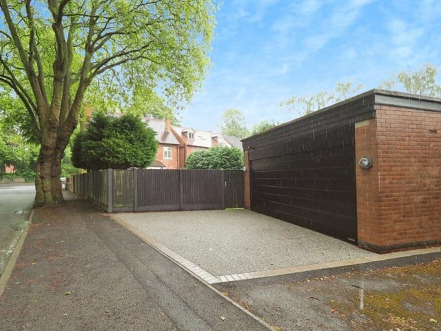 At the back of the house sits off-street parking space for two cars, in front of a detached double garage, with electric roller door, power and lighting. The garage can be put to conventional use or be converted into a home office or business base.