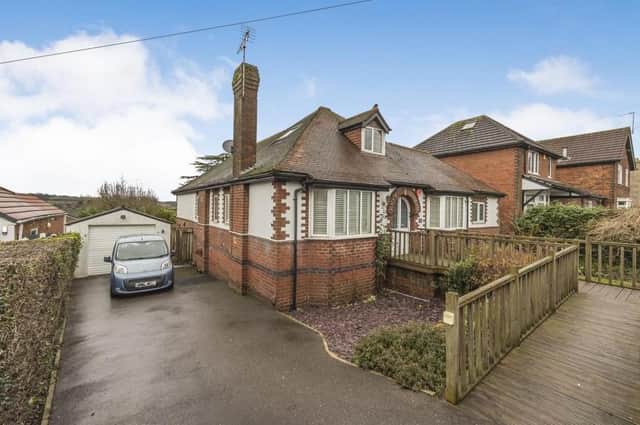Offers of more than £475,000 are invited by estate agents Burchell Edwards for this pretty three-bedroom bungalow on Dovecote Road, Eastwood.