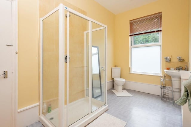 Between two of the bedrooms on the first floor is this en suite shower room, complete with shower cubicle, WC and hand wash basin.