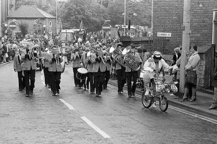 A brass band entertained the crowds druring the procession of the 1980 Mansfield Carnival. The carnival still takes place to this day, and is a celebration of the town's cultural diversity, including the Windrush generation, and features a parade, live music, and other activities.