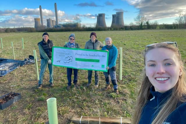 Katie Doull of the Sherwood Forest Trust and tree planting volunteers from Aviva's Sheffield offices.