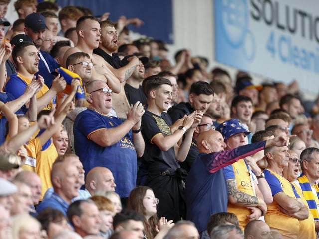 Mansfield Town fans enjoy the 3-1 win at Doncaster Rovers.
